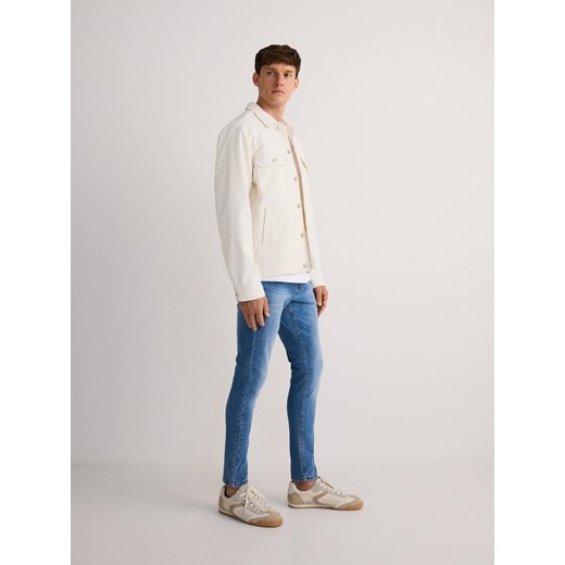 Reserved - Jeansy skinny z efektem sprania - niebieski Reserved 32 Reserved