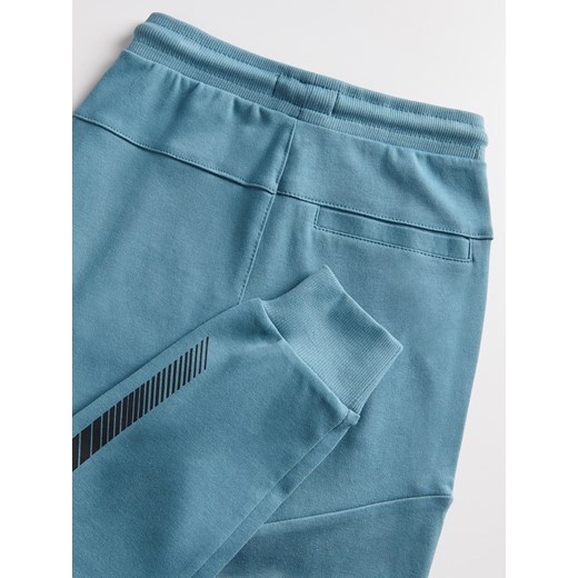 Reserved - Dresowe spodnie jogger - ciemny turkus Reserved 128 (7-8 lat) Reserved