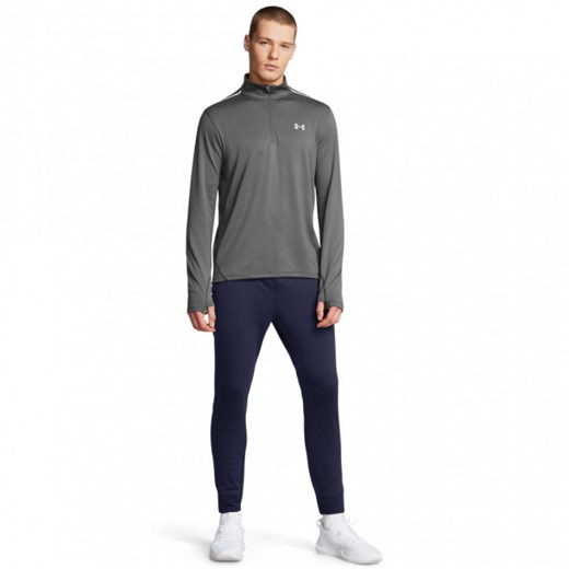 Męskie spodnie treningowe Under Armour UA Vanish Cw Fitted Pant - granatowe ze sklepu Sportstylestory.com w kategorii Spodnie męskie - zdjęcie 175187090