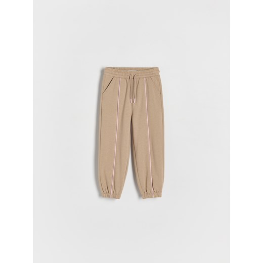Reserved - Spodnie dresowe z przeszyciami - beżowy Reserved 104 (3-4 lata) Reserved