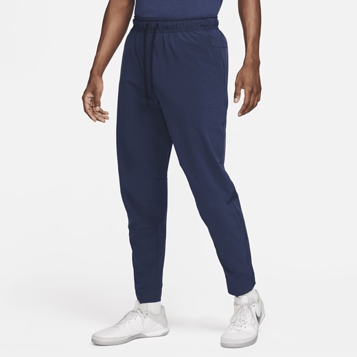 Męskie uniwersalne spodnie ze ściągaczami i zamkami Dri-FIT Nike Unlimited - Nike L Nike poland