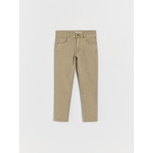 Reserved - Elastyczne spodnie slim - beżowy Reserved 116 (5-6 lat) Reserved