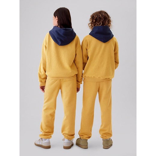 GAP Spodnie dresowe w kolorze żółtym Gap 110 wyprzedaż Limango Polska