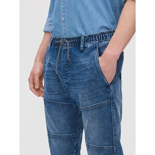 Cropp - Jeansowe joggery slouchy - niebieski Cropp 28/30 promocja Cropp