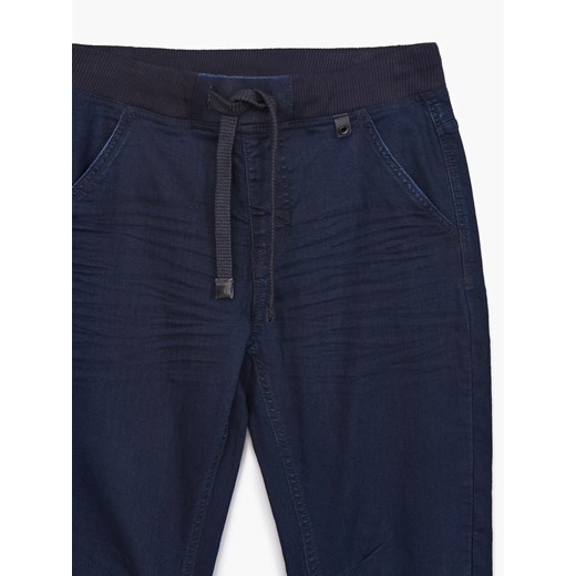Cropp - Jeansowe joggery - surowy granatowy Cropp 34/34 promocyjna cena Cropp