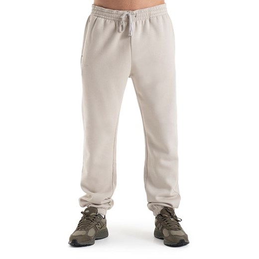 Spodnie Champion Eco Future Fleece Joggers 220424-ES057 - białe ze sklepu streetstyle24.pl w kategorii Spodnie męskie - zdjęcie 175929050