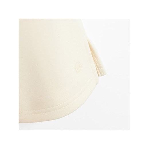 COOL CLUB Spodnie dresowe w kolorze kremowym Cool Club 116 okazja Limango Polska