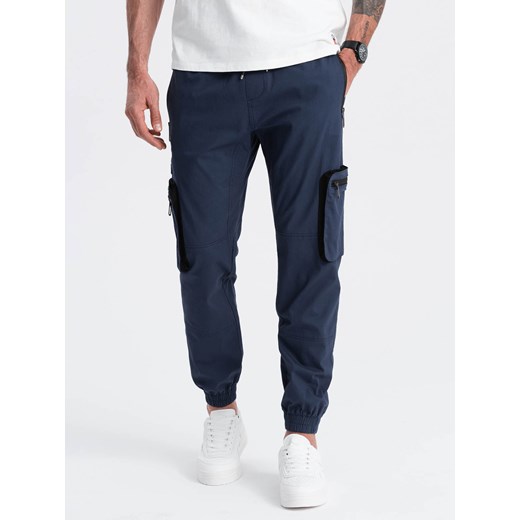 Męskie spodnie JOGGERY z zapinanymi kieszeniami cargo - granatowe V5 XL ombre