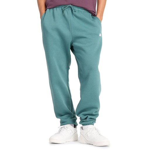 Spodnie New Balance MP41503NUS - niebieskie ze sklepu streetstyle24.pl w kategorii Spodnie męskie - zdjęcie 176299240