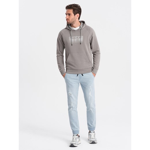Męskie spodnie jeansowe JOGGERY z przetarciami - jasnoniebieskie V1 OM-PADJ-0150 ze sklepu ombre w kategorii Jeansy męskie - zdjęcie 176312300
