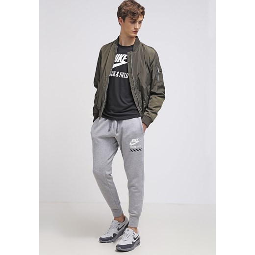 Nike Sportswear Spodnie treningowe dark grey/white zalando  bawełna