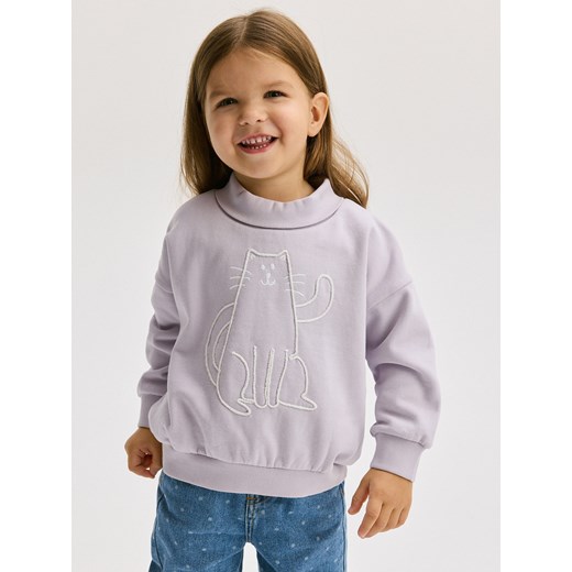 Reserved - Bawełniana bluza z aplikacją - lawendowy ze sklepu Reserved w kategorii Bluzy dziewczęce - zdjęcie 176366660