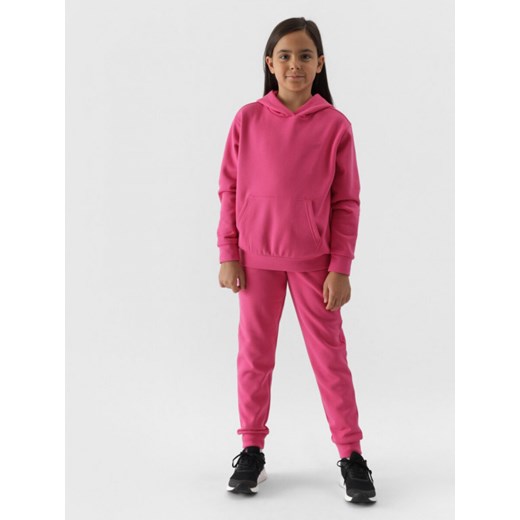 Dziewczęce spodnie dresowe joggery 4F 4FJWMM00TTROF0828 - różowe ze sklepu Sportstylestory.com w kategorii Spodnie dziewczęce - zdjęcie 176418780