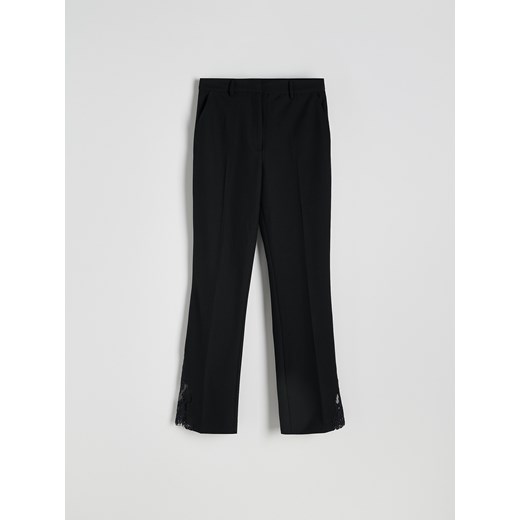 Reserved - Spodnie z koronkowym wykończeniem - czarny Reserved XS Reserved