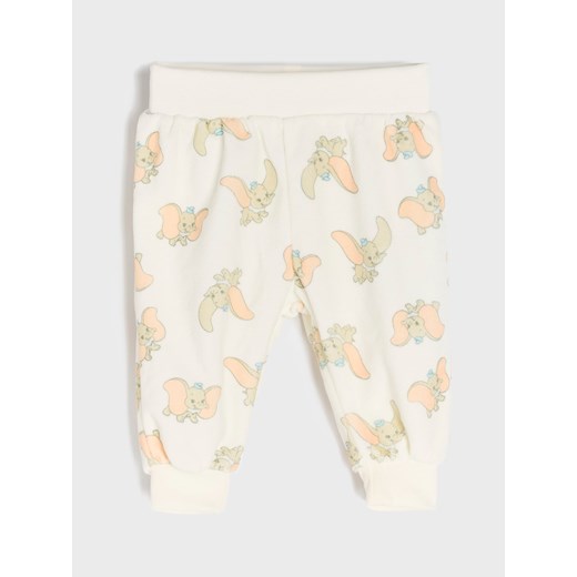 Sinsay - Spodnie Disney - kremowy Sinsay 74 Sinsay