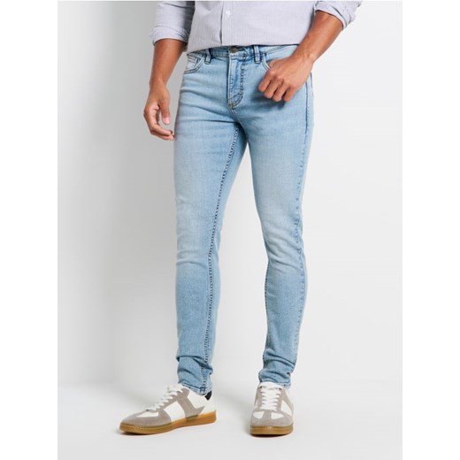 Sinsay - Jeansy SUPER SKINNY - niebieski Sinsay 30/32 Sinsay