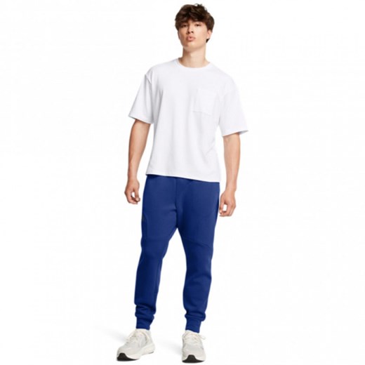 Męskie spodnie treningowe Under Armour UA Unstoppable Flc Jgr Eu - niebieskie ze sklepu Sportstylestory.com w kategorii Spodnie męskie - zdjęcie 176552411