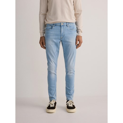 Reserved - Jeansy skinny z efektem sprania - niebieski ze sklepu Reserved w kategorii Jeansy męskie - zdjęcie 176599672
