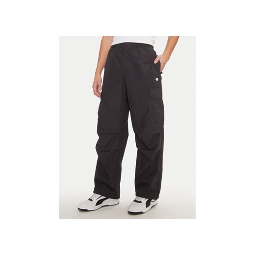 Champion Spodnie dresowe 220414 Czarny Loose Fit ze sklepu MODIVO w kategorii Spodnie męskie - zdjęcie 176607310