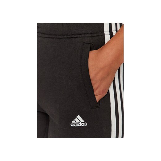 adidas Spodnie dresowe Essentials 3-Stripes IC6126 Czarny Slim Fit 14_15Y MODIVO