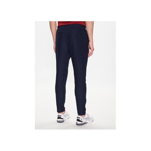 Skechers Spodnie dresowe Ultra Go Lite MPT108 Granatowy Tapered Fit Skechers L MODIVO