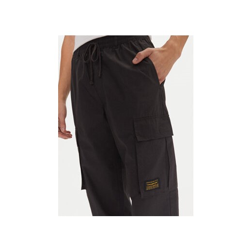 Champion Spodnie dresowe 220415 Czarny Loose Fit Champion XXL MODIVO