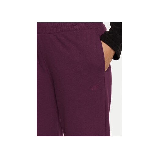 4F Spodnie dresowe 4FWMM00TTROF0945 Fioletowy Regular Fit L MODIVO