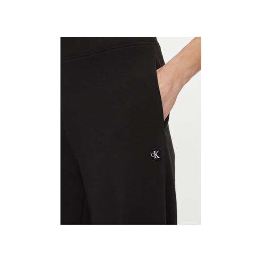 Calvin Klein Jeans Spodnie dresowe Ck Embro Badge Knit Pant J20J222597 Czarny M MODIVO