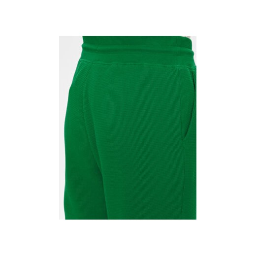 Tommy Hilfiger Spodnie dresowe UW0UW04946 Zielony Relaxed Fit Tommy Hilfiger M MODIVO