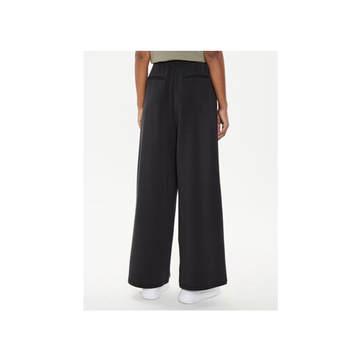 Guess Spodnie dresowe V4YB07 KCAY2 Czarny Relaxed Fit Guess XXS MODIVO