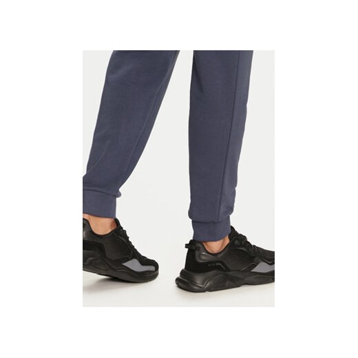 4F Spodnie dresowe 4FWMM00TTROM0942 Niebieski Regular Fit S MODIVO