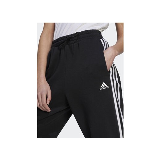 adidas Spodnie dresowe Essentials 3-Stripes Open Hem Fleece HZ5748 Czarny Loose XL MODIVO