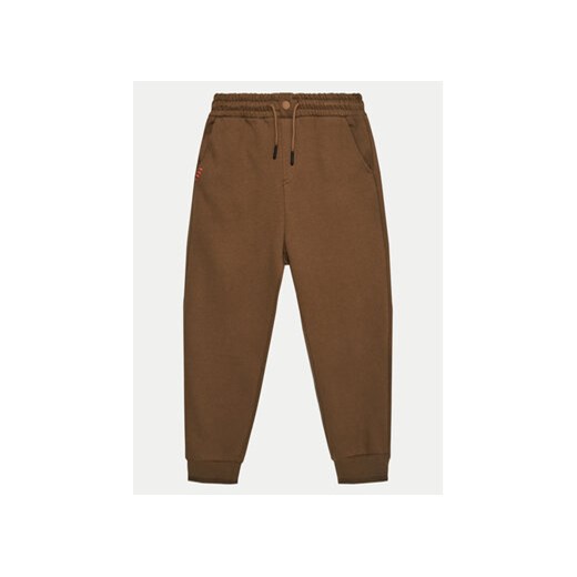 United Colors Of Benetton Spodnie dresowe 3HLMCF05N Brązowy Regular Fit ze sklepu MODIVO w kategorii Spodnie chłopięce - zdjęcie 176722603