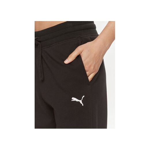 Puma Spodnie dresowe HER 677889 Czarny Relaxed Fit Puma L MODIVO