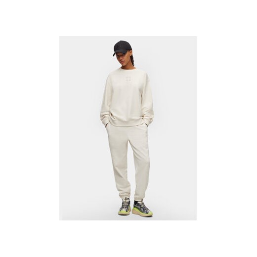 Hugo Spodnie dresowe 50500460 Biały Relaxed Fit XL MODIVO