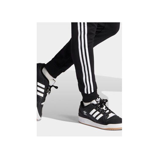 adidas Spodnie dresowe adicolor Classics SST IL2488 Czarny Slim Fit XXL MODIVO