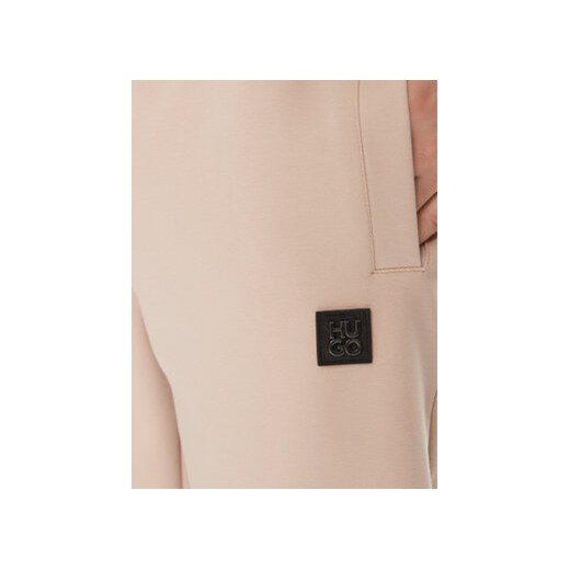 Hugo Spodnie dresowe Dimacs 50509457 Beżowy Relaxed Fit M MODIVO