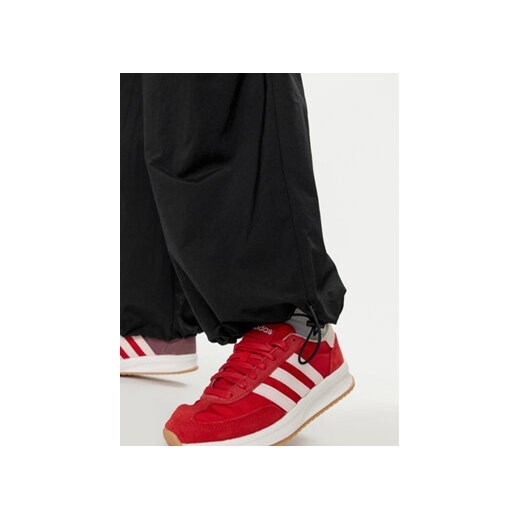 adidas Spodnie dresowe City Escape Woven Parachute IV9780 Czarny Loose Fit M MODIVO