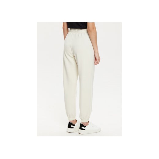 Guess Spodnie dresowe V5RB11 KCAY2 Écru Regular Fit Guess S MODIVO