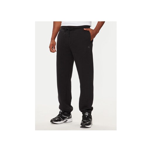 Calvin Klein Jeans Spodnie dresowe J30J326401 Czarny Relaxed Fit M MODIVO