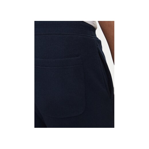 Tommy Jeans Spodnie dresowe Flag DM0DM20473 Granatowy Slim Fit Tommy Jeans S MODIVO