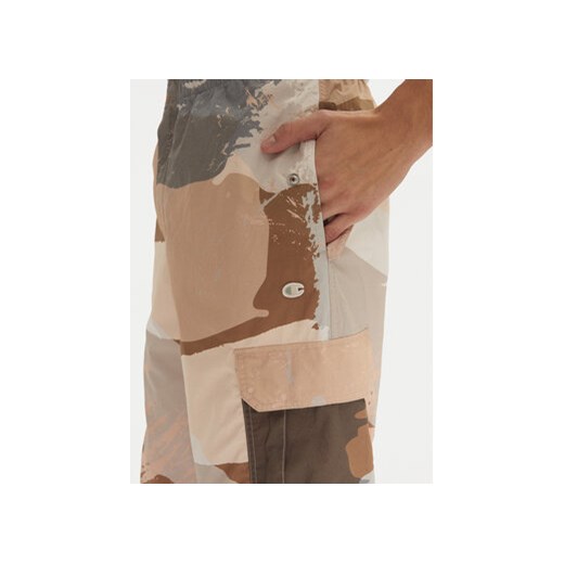 Champion Spodnie dresowe 220414 Beżowy Loose Fit Champion S MODIVO