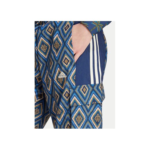 adidas Spodnie dresowe FARM Rio Premium IV9760 Granatowy Loose Fit XXS MODIVO