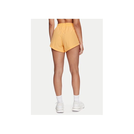 adidas Szorty sportowe City Escape Summer IS0662 Żółty Loose Fit L MODIVO
