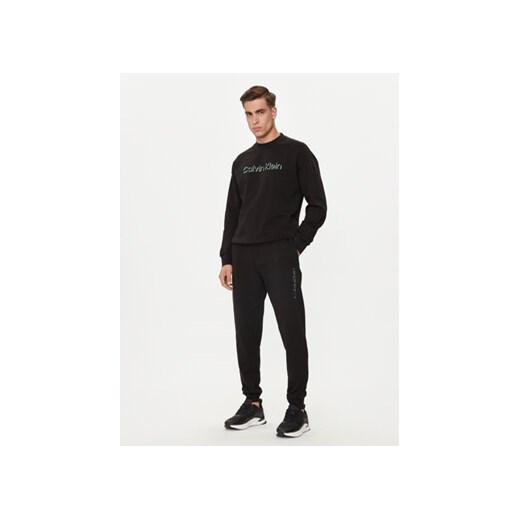 Calvin Klein Spodnie dresowe Shadow Embosed Logo K10K113097 Czarny Regular Fit Calvin Klein S MODIVO