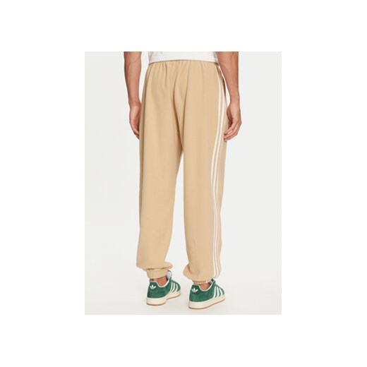 adidas Spodnie dresowe adicolor 3-Stripes IZ2490 Beżowy Regular Fit XXL MODIVO