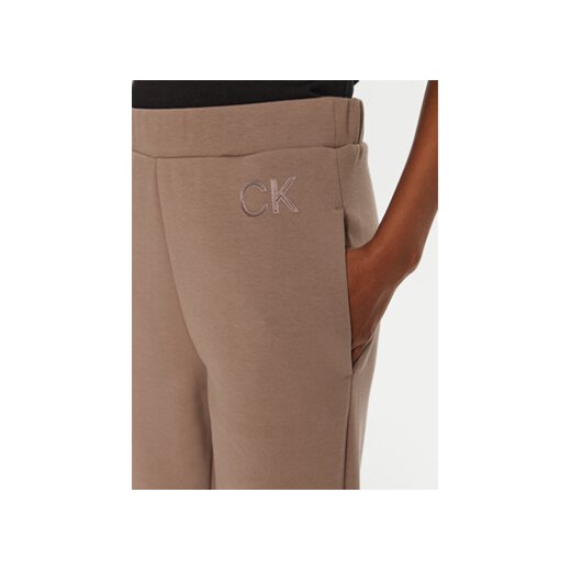 Calvin Klein Spodnie dresowe Satin K20K207945 Beżowy Slim Fit Calvin Klein XXL MODIVO