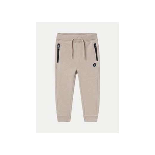 NAME IT Spodnie dresowe 13220380 Beżowy Regular Fit Name It 110 MODIVO