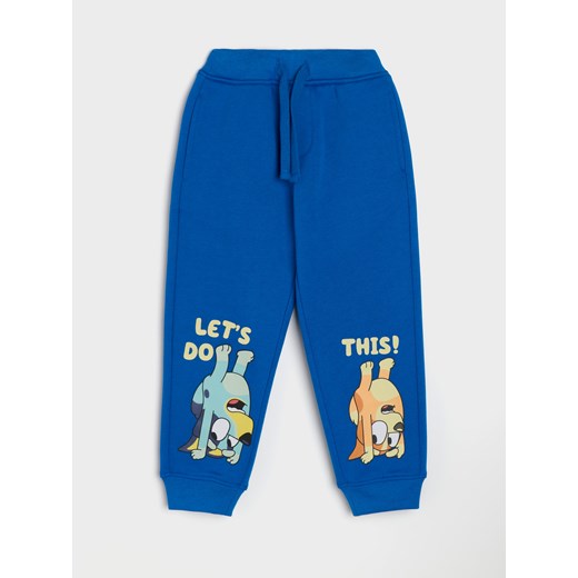Sinsay - Spodnie dresowe Bluey - mid blue Sinsay 110 Sinsay