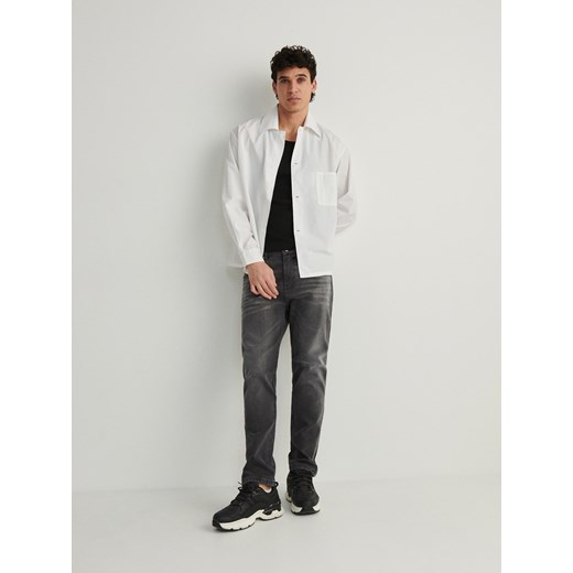 Reserved - Jeansy slim fit z efektem sprania - szary Reserved 36 promocyjna cena Reserved